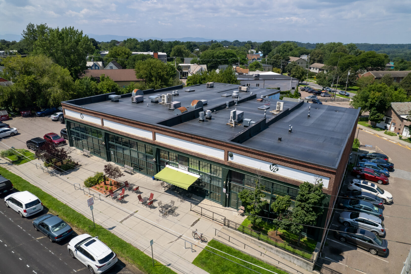 A new flat EPDM rubber roof on a commercial building in Burlington, Vermont.