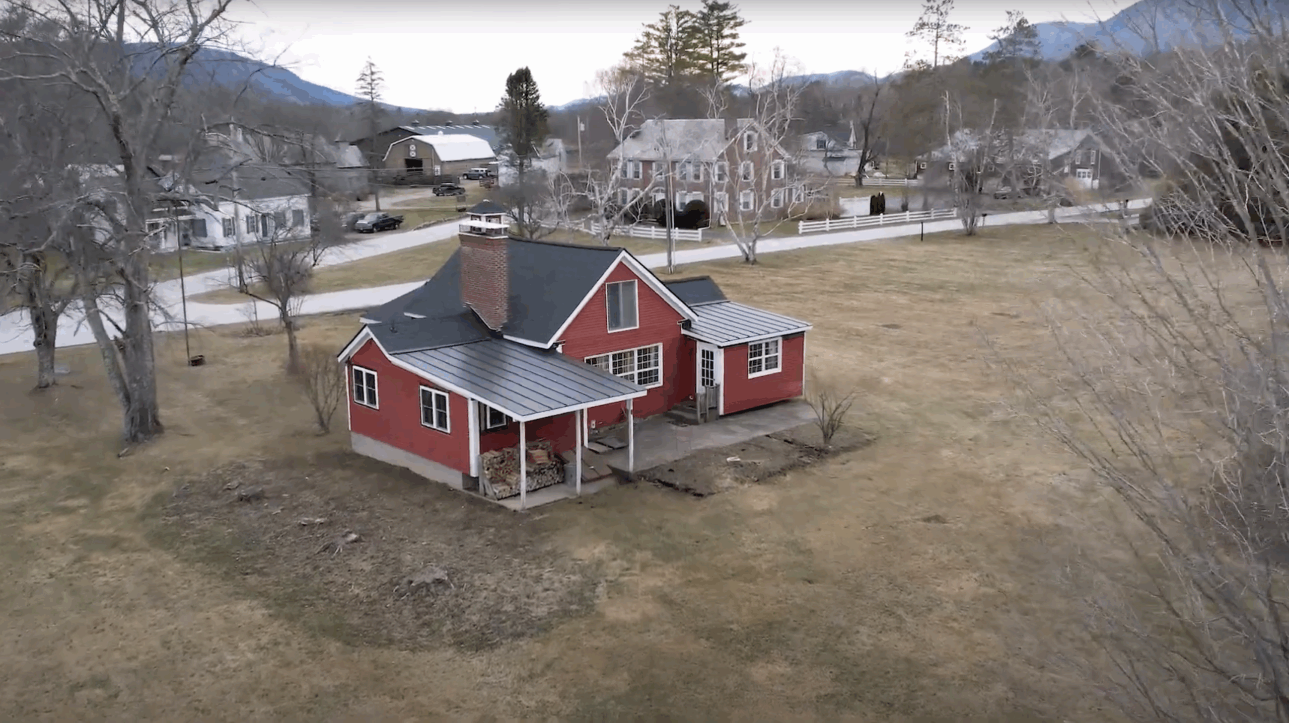 Standing seam and asphalt shingle roof on a single family home in Manchester, Vermont
